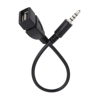 Black car aux usb audio cable with molded plastic housing and metallic 3.5mm connector for cable car electronics use