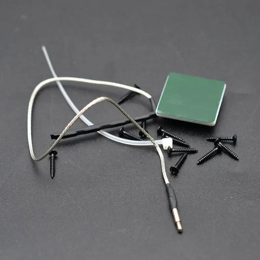 Black and silver electronic ukulele pickup cable with green adhesive pad for 3 band guitar eq equalize tuner system