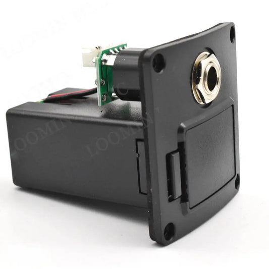 Black plastic guitar output jack with gold-plated input hole and green circuit board for folk guitar preamp eq