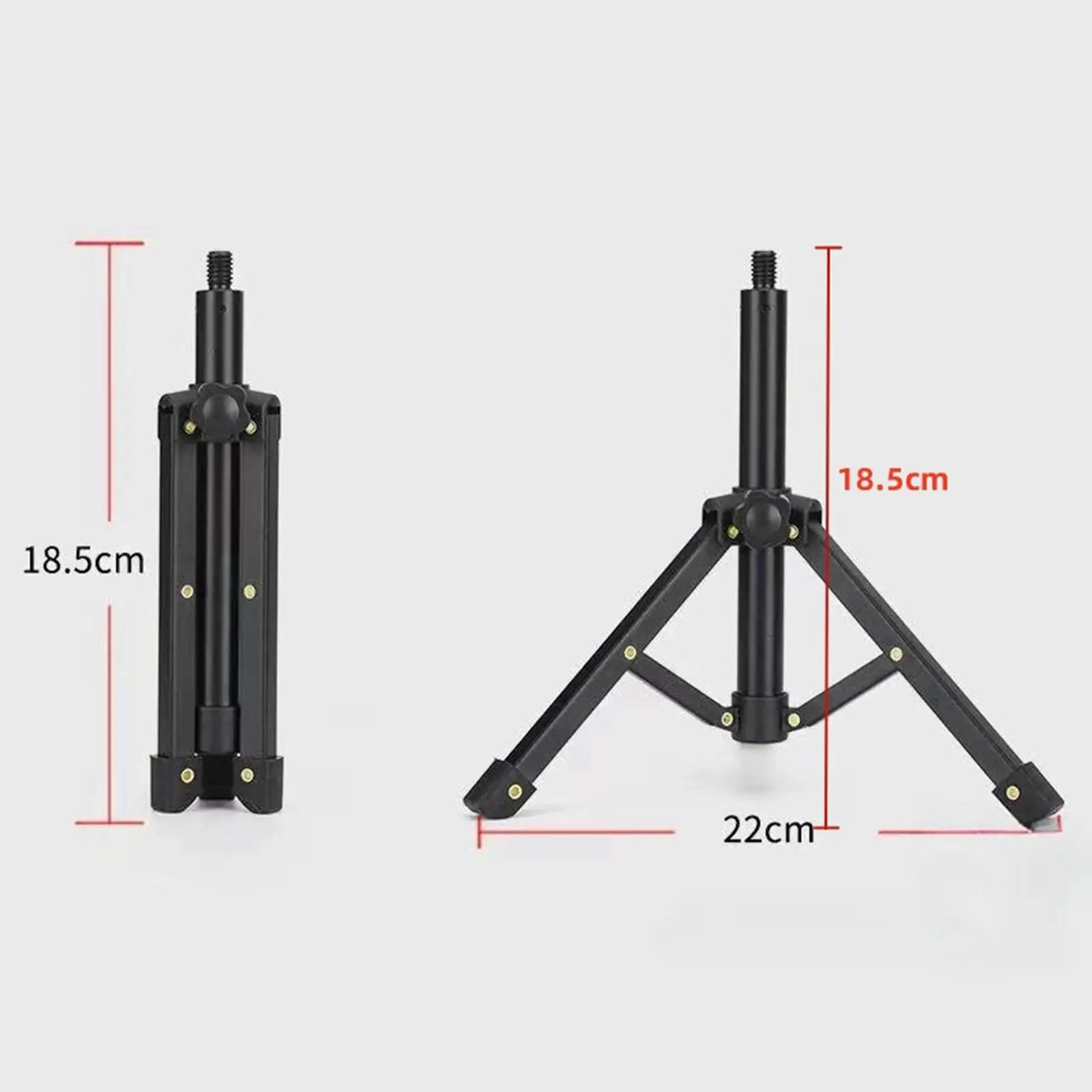 Black collapsible tripod stand with adjustable legs and central column for stable support in vocal recording panel setup