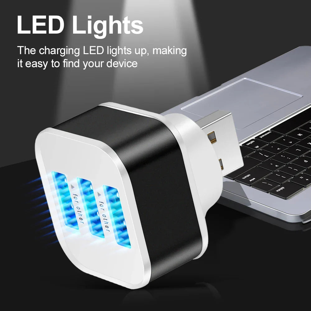 Black and white 3 port usb extender hub quick charge with three glowing blue led lights for phone tablet charging