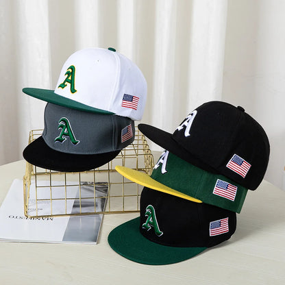 Hip-hop style baseball cap with a flat top, color patching, letter embroidery. Suitable for both women and men