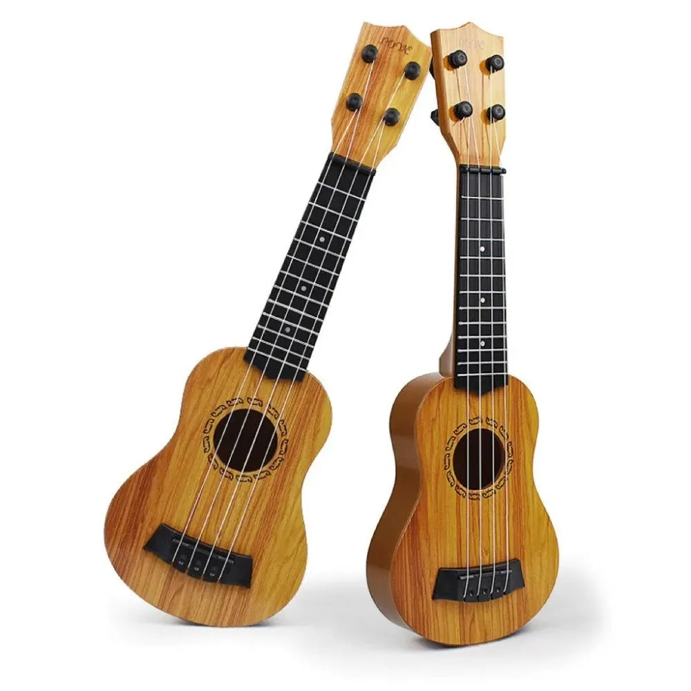Two light brown wooden 35cm children guitar toy with black fretboards and paddles simulating yukrili music toys