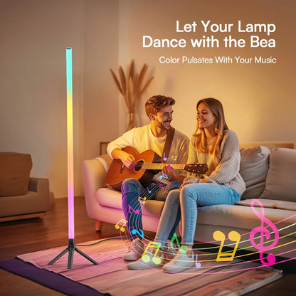 A tall slender luminous floor ambient led lamp with tri-legged base and ambient light rgbic pulsing to rhythm sound pickup