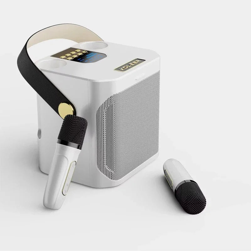 White portable karaoke boombox with black strap gold accent and digital display screen for stereo surround karaoke use