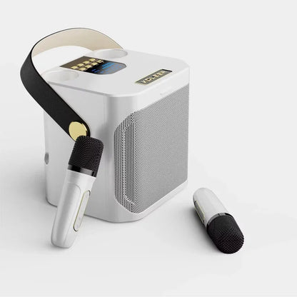 White portable karaoke boombox with black strap gold accent and digital display screen for stereo surround karaoke use