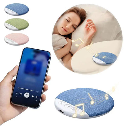 Blue denim-textured circular pillow speaker with white control panel and usb port for surround sound bluetooth and white noise timer