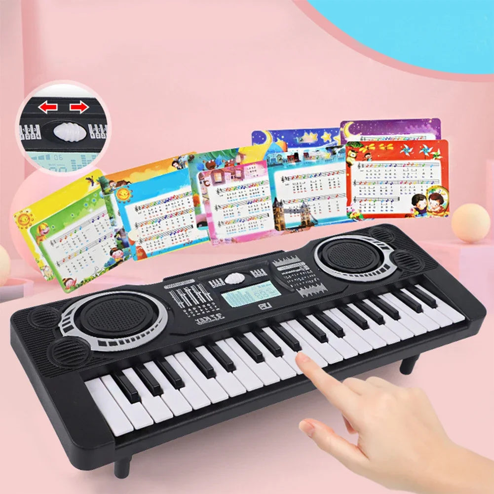 Black plastic electronic piano keyboard with white and black keys silver speaker grilles and digital display portable educational toy musical instrument organ