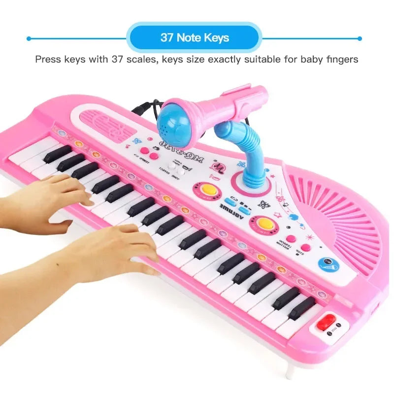 Pink 37 key electronic keyboard with black white keys and blue microphone musical instrument toy for children educational use