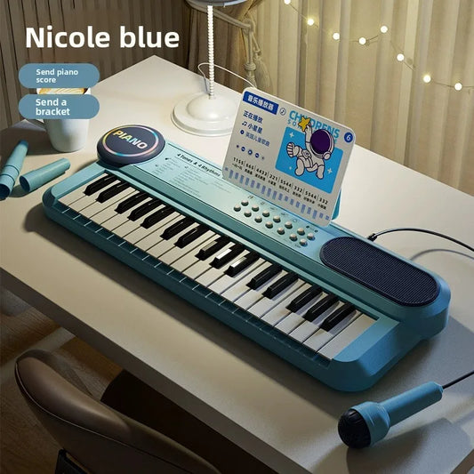 Nicole blue kids piano keyboard with turquoise plastic keys built-in speaker and microphone music score for early learning interactive play