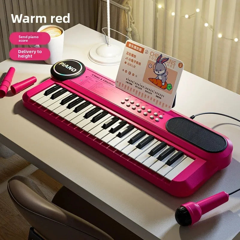 Bright pink 37-key kids piano keyboard with black and white keys built-in speaker and microphone music score for early learning interactive play