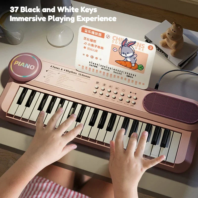 Pink 37-key kids piano keyboard with black and white keys microphone music score for early learning interactive play