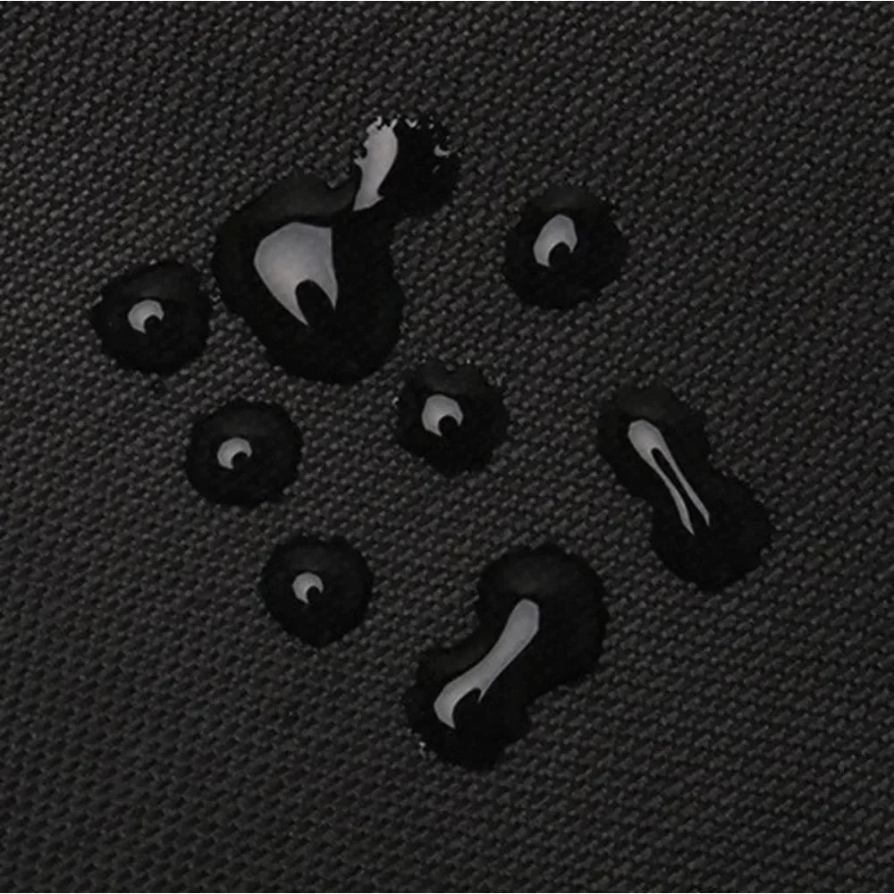 Black inch oxford fabric with water-resistant droplets on a padded acoustic guitar waterproof backpack case