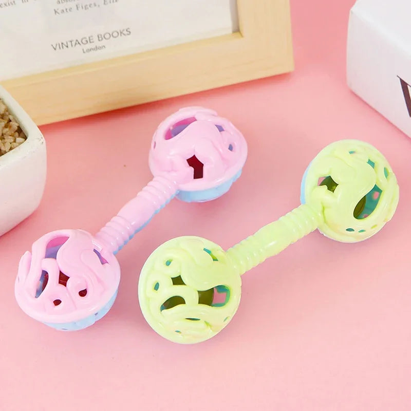 3pcs double-headed plastic small toy rattle in pink, light blue, and lime green with elephant designs holding bell gift