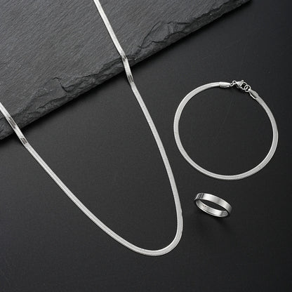 Silver stainless steel snake chain necklace with sleek interlocking links in a fashion hip hop minimalist necklace bracelet ring set perfect for gifting