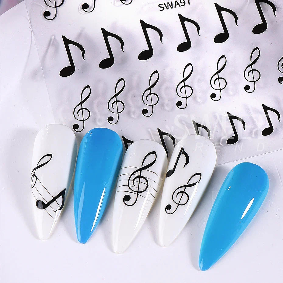 Blue and white nail art with 3pcs musical notes stickers 3d black featuring y2k metallic holographic treble clefs design