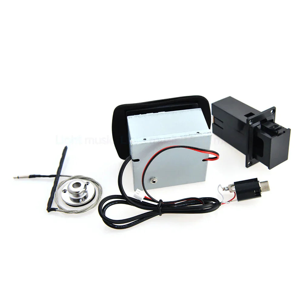 Silver rectangular guitar pickup preamp with black plastic casing and wiring for piezo pickup preamp eq equalizer use
