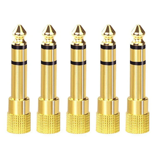 Five gold-colored 3.5mm adapter plugs with black bands for headphone amplifier ha400 stereo audio amplifier use
