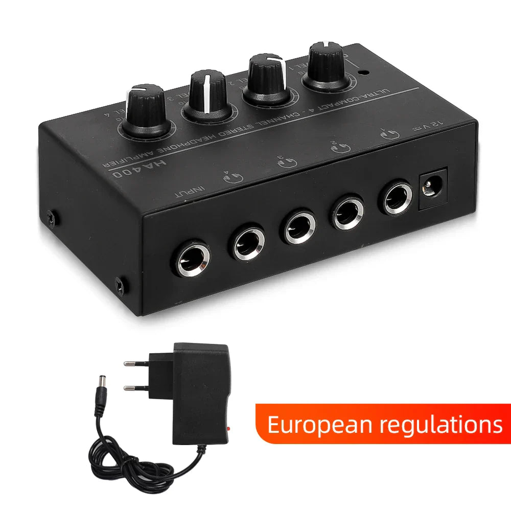 Black rectangular headphone amplifier ha400 with four black rotary knobs and silver-plated jacks ultra-compact stereo audio amplifier