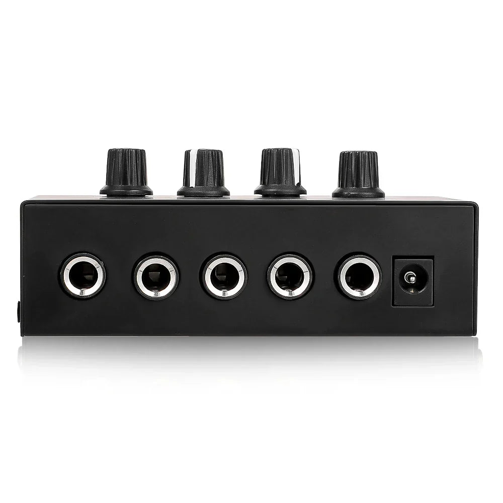 Black rectangular headphone amplifier ha400 with four knobs five silver-jack inputs and power port for stereo audio amplifier use