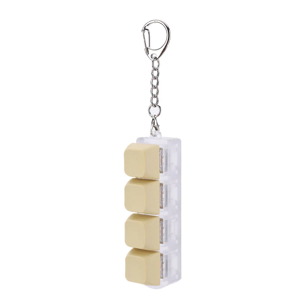 Clear plastic keychain featuring four beige square keyboard keys stacked vertically as a keycap fidget keychain and keyboard clicker toy