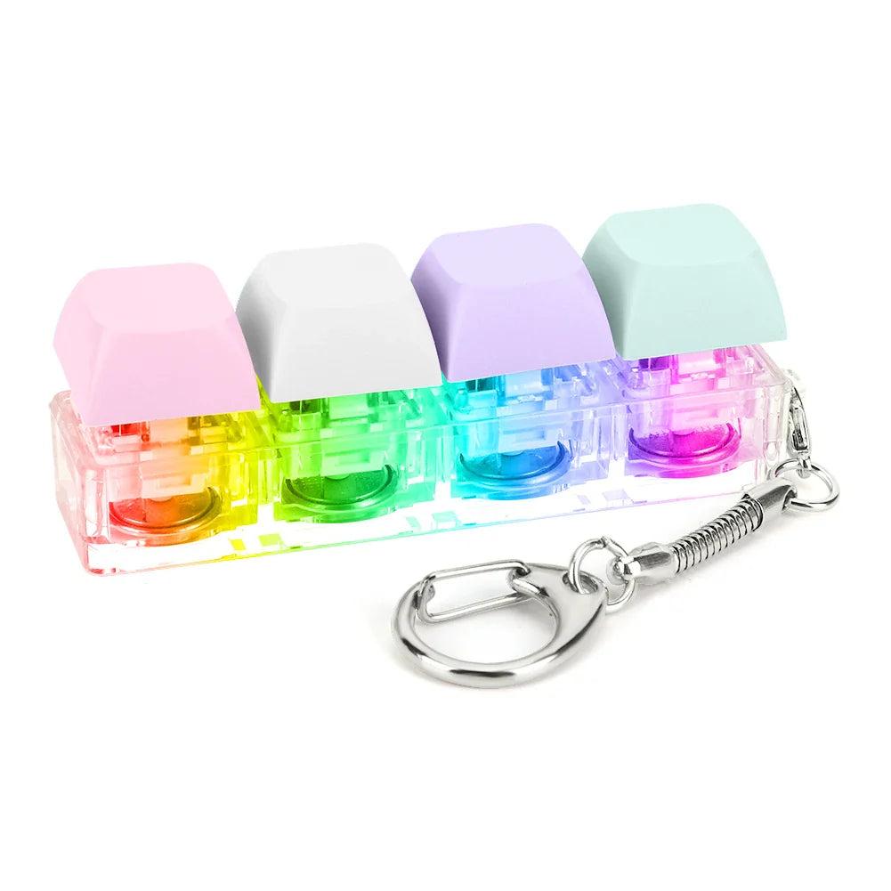 Rainbow-colored translucent keycap fidget keychain with pastel pink white lavender mint green caps keyboard clicker toy