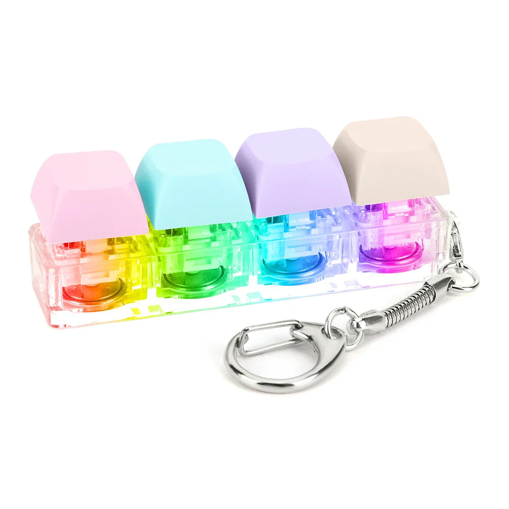 Rainbow-colored translucent keycap fidget keychain with pastel pink blue lavender and beige caps keyboard clicker toy