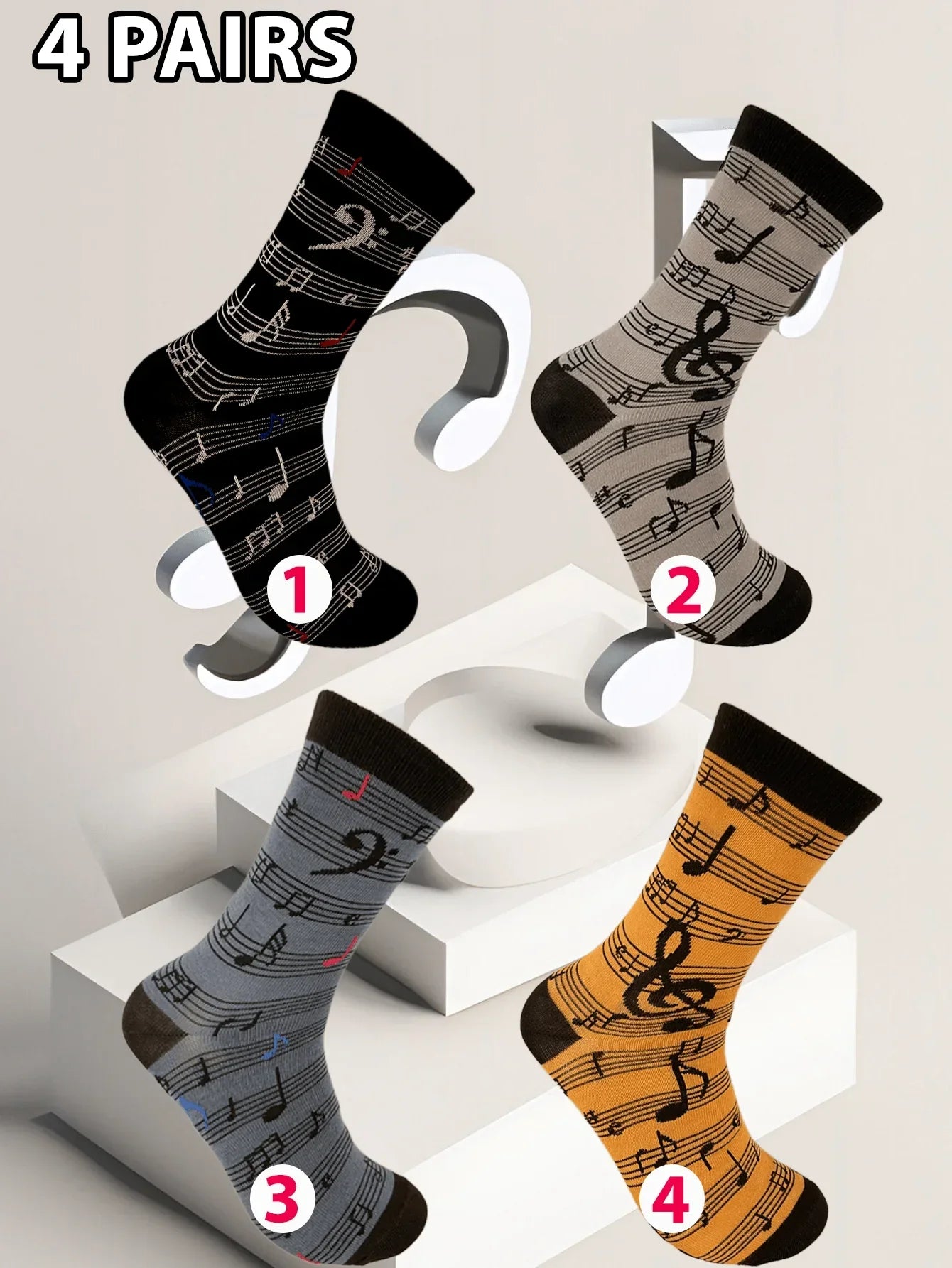 Four pairs of men’s fashion music symbol socks in black gray and orange with a symbol personality interesting pattern combination