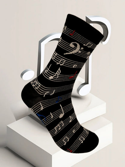 Black sock with a fashion music symbol pattern of white red and blue notes in a symbol personality interesting sock set