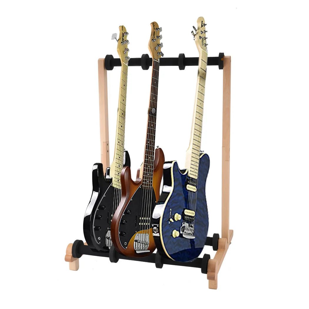 Light wood 4 rows multi guitar stand with black rubber grips holding three electric guitar ukulele and bass instruments