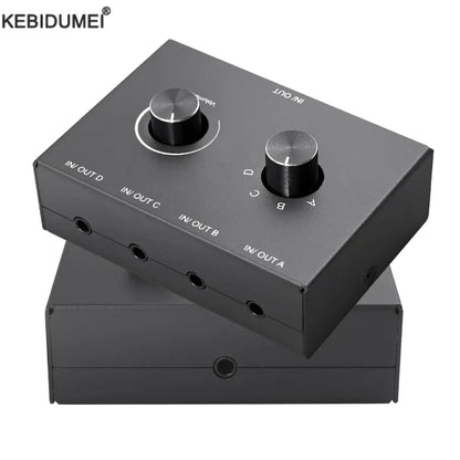 Black kebidumei 4 way 2 way 3.5mm stereo audio switcher box with two rotary knobs and four ports switch splitter box