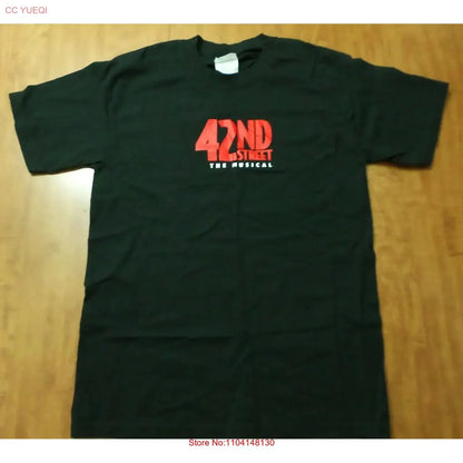 Black short-sleeved 42nd street broadway small tee with bold red and white vintage production depression graphic