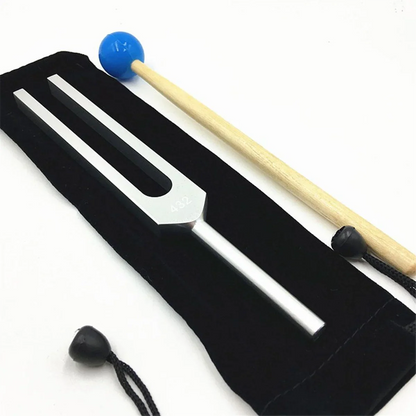 Silver-toned tuning fork with blue rubber-tipped wooden mallet in black velvet pouch for a432 hz tuning sound healing