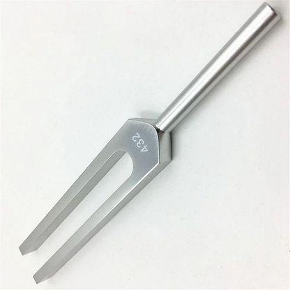 A sleek silver-toned tuning fork made of high-quality materials for a432 hz tuning and clinical sound healing use