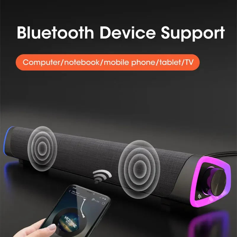 Black fabric-wrapped computer speaker bar with purple led control knob featuring stereo sound subwoofer bluetooth connectivity
