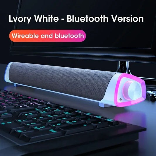 Ivory white computer speaker bar with textured fabric grille and glowing pink accent sound subwoofer bluetooth