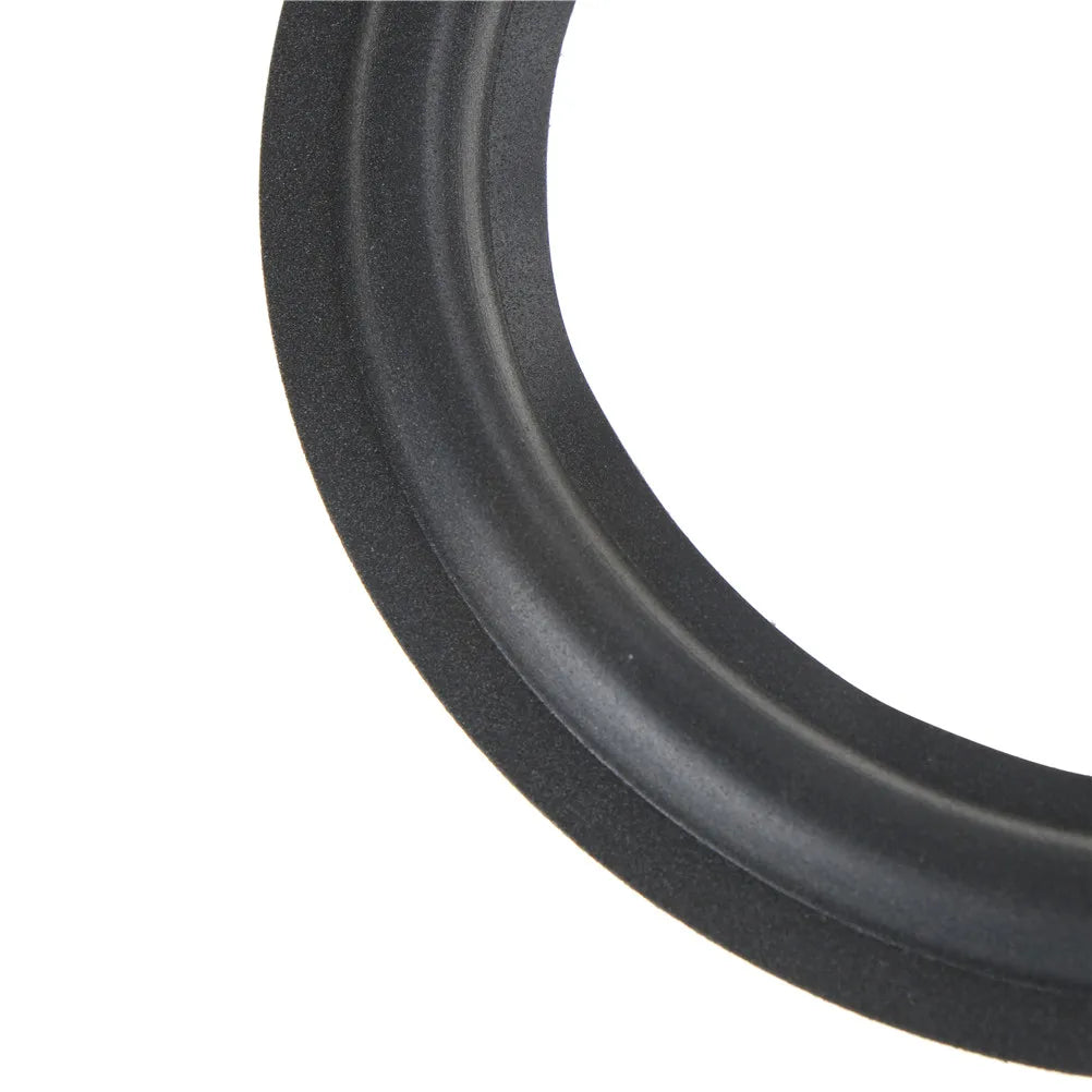 Black rubber universal speaker surround repair foam with smooth textured surface and concentric convex inside diameter ridges
