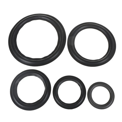 Set of four black rubber universal speaker surround repair foam gaskets with varying convex inside diameter sizes