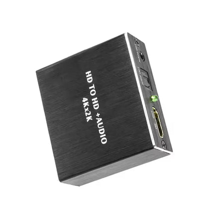 Black brushed metal 4k x 2k video audio extractor hdtv with green power indicator and hdmi ports on back side