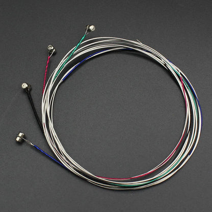 Set of five violin strings with steel core nickel and nickel silver wound coatings in red green blue and silver colors