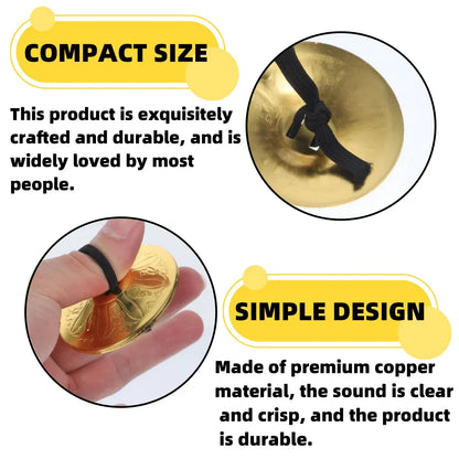 Gold-colored compact copper finger cymbals belly with black strap for dance hand cymbals performances and music