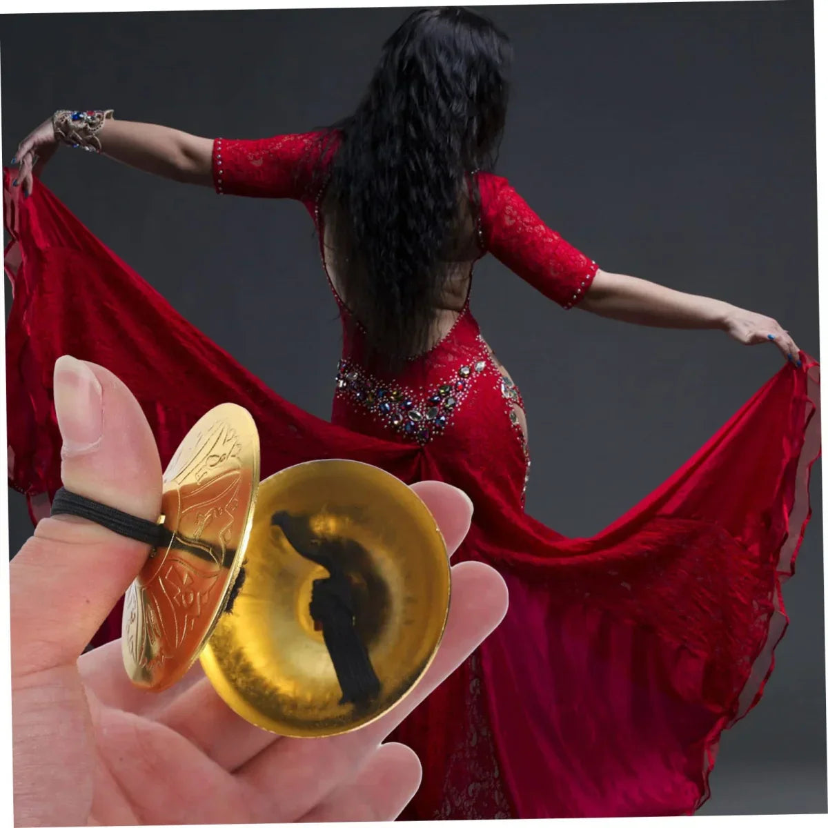 Golden copper finger cymbals belly dance hand cymbals with intricate engraved designs for musical performances