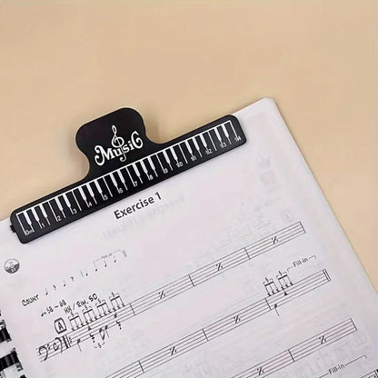 Black piano-key design 4pcs music book clip with music logo securing sheet music for ultimate music book and sheet music stands