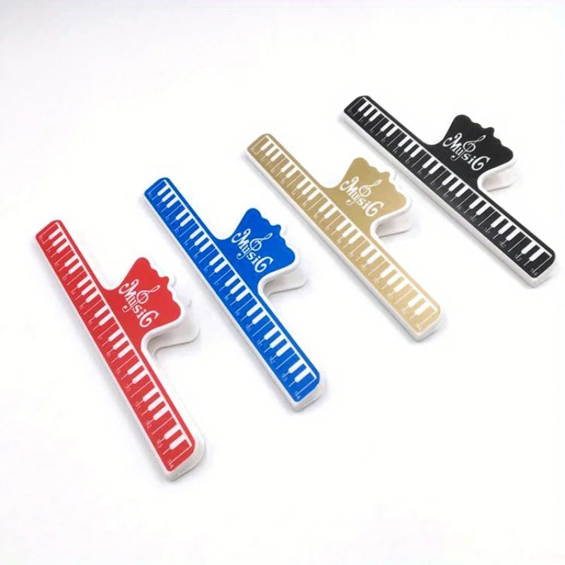 4pcs music book clip set featuring colorful piano-key themed plastic clips in red blue gold and black for sheet music stands