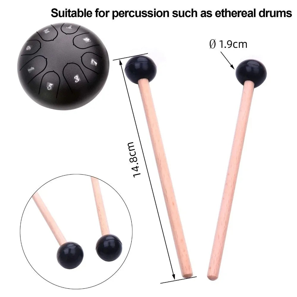 Black 8-note hand drum with white number markings and wood handle wooden drumsticks with rubber and silicone heads