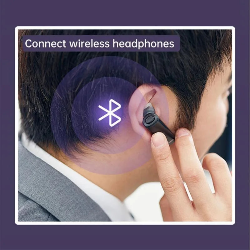 Black wireless earbud with sleek compact design paired with adapter usb wireless bluetooth transmitter receiver for audio use
