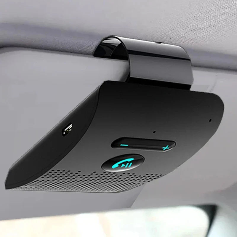 Black handsfree car kit with sleek curved design and glowing blue call button wireless audio receiver music player noise