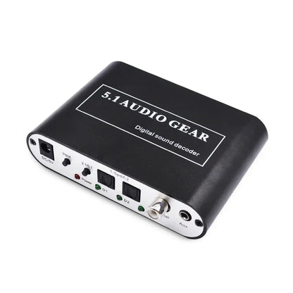 Black 5.1 audio decoder digital sound dts ac3 pcm with silver accents showing labeled aux coaxial optical input and power ports back side