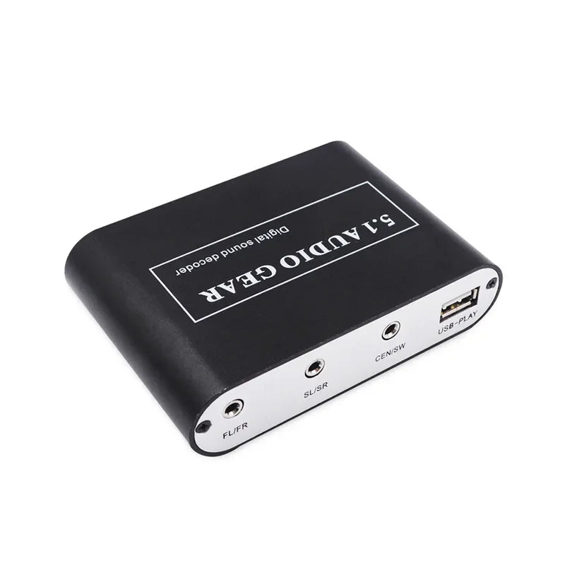 Black rectangular 5.1 digital audio decoder with silver accents showing rear aux coaxial usb speaker and subwoofer ports for dolby pro logic