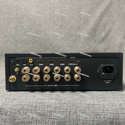 Black audio receiver with gold-plated hdmi optical coaxial and speaker ports back side for dolby atmos decoding and playback dsd lossless